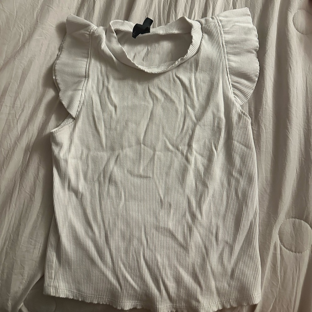 Francesca’s white shirt